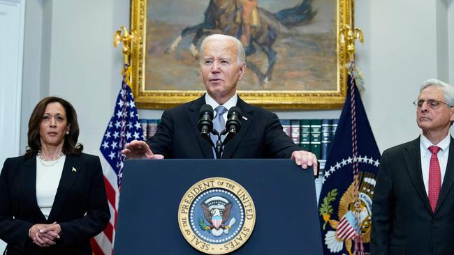 US President Joe Biden speaks as Vice President Kamala Harris and Attorney General Merrick Garland look on. Picture: AFP