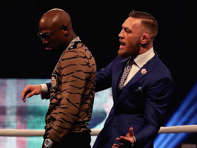 LONDON, ENGLAND - JULY 14:  Floyd Mayweather Jr. and Conor McGregor during the Floyd Mayweather Jr. v Conor McGregor World Press Tour at SSE Arena on July 14, 2017 in London, England.  (Photo by Matthew Lewis/Getty Images)