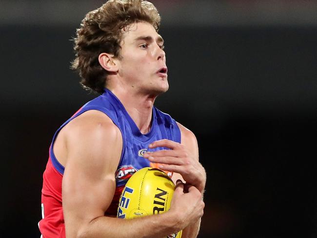 ADELAIDE, AUSTRALIA - JULY 03: Deven Robertson of the Lions marks the ball during the 2021 AFL Round 16 match between the Adelaide Crows and the Brisbane Lions at Adelaide Oval on July 3, 2021 in Adelaide, Australia. (Photo by Sarah Reed/AFL Photos via Getty Images)