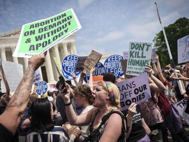 Pro-choice and anti-abortion activists confront one another in front of the U.S. Supreme Court Building on May 3. Picture: Win McNamee