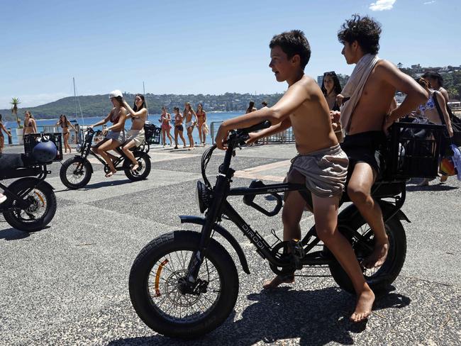 Pictured in Manly are young people using the hugely popular DiroDi Rover E- Bike. Picture: Richard Dobson