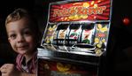 16/01/15 - Shonica Guy of Campbelltown doesn't want her son Izaya, 2, playing with 'pokie toys' as these are designed to encourage kids to use poker machines later in life. Photo Tom Huntley Shonica 0410 373 332