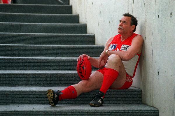 8: RON BARASSI. Ron Barassi ponders his last training session as coach of the Sydney Swans in 1995. Barassi was the first player to be inaugurated into the Australian Football Hall of Fame as a Legend.