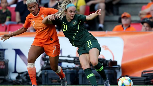 Dutch attacker Shanice van de Sanden of Netherlands (L) challenges Ellie Carpenter during the pre-World Cup friendly in Eindhoven. Picture: Getty Images