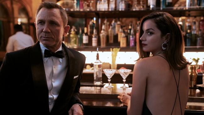 Daniel Craig stars as James Bond and Ana de Armas as Paloma in No Time to Die. Picture: Nicola Dove