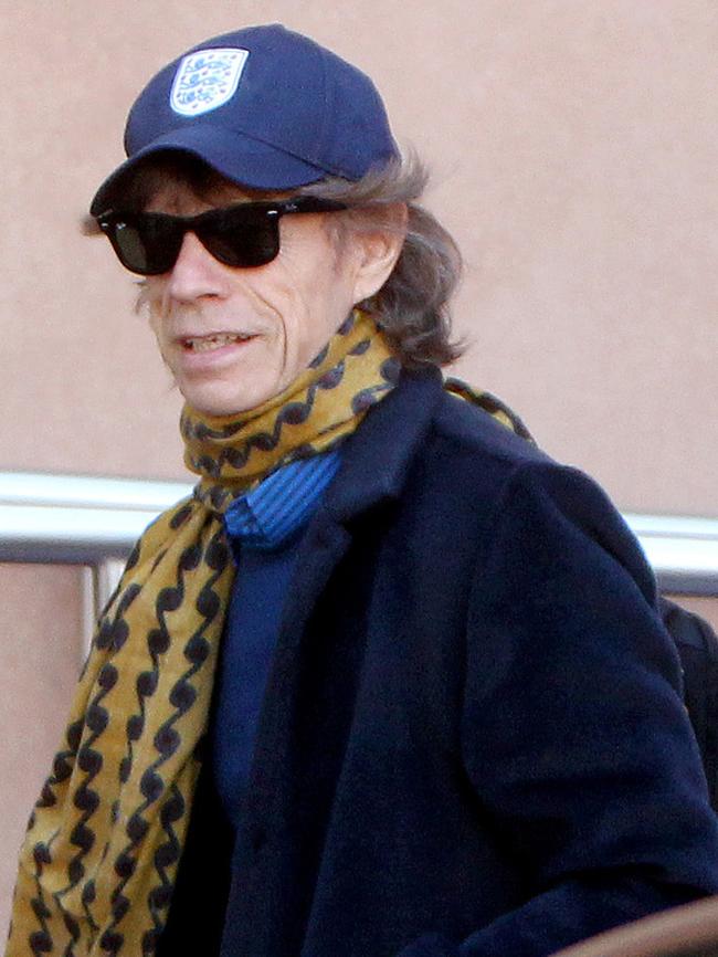 An hour of privacy ... Mick Jagger leaves the Intercontinental Hotel in Adelaide. Picture: Calum Robertson