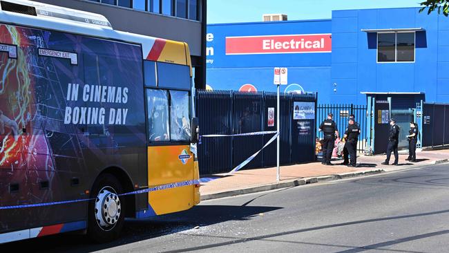 Police at the scene of the bus brawl. Picture: Brenton Edwards