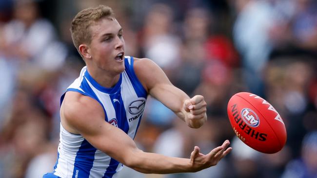 MELBOURNE, AUSTRALIA - MARCH 03: Tom Powell of the Kangaroos in action during the 2024 AFL AAMI Community Series match between the St Kilda Saints and North Melbourne Kangaroos at RSEA Park on March 03, 2024 in Melbourne, Australia. (Photo by Dylan Burns/AFL Photos via Getty Images)