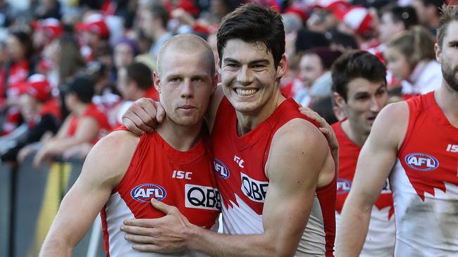 Zak Jones and George Hewett do the dirty work for the Swans. Picture: Getty Images