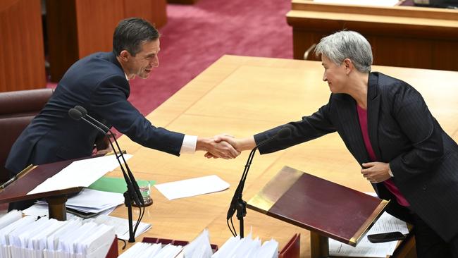 Penny Wong congratulates Simon Birmingham after his valedictory speech in the Senate. Picture: Martin Ollman/NewsWire