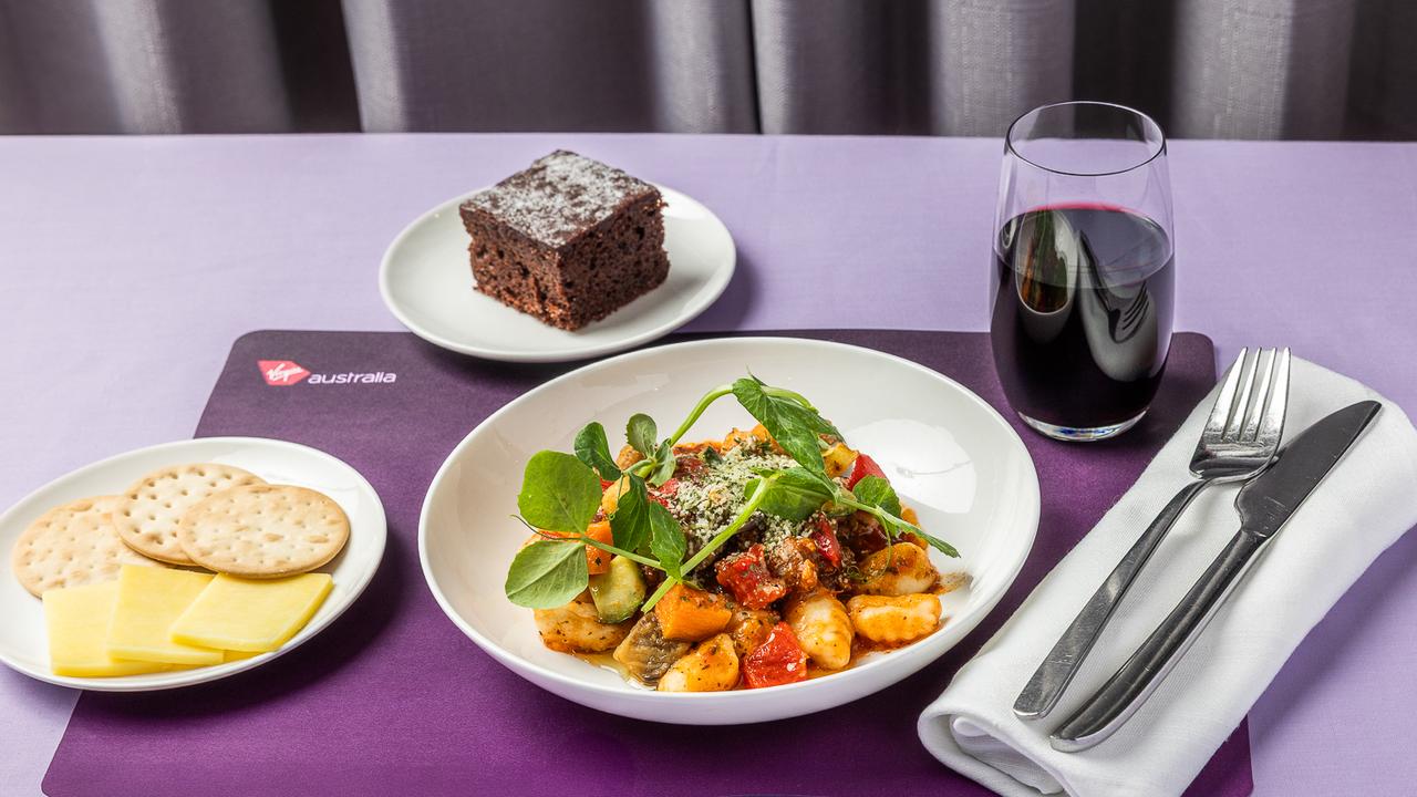 Looks oretty tasty - this is the beef ragu and potato gnocchi with roasted vegetables and eggless chocolate cake - and some cheese and crackers and a glass of red.