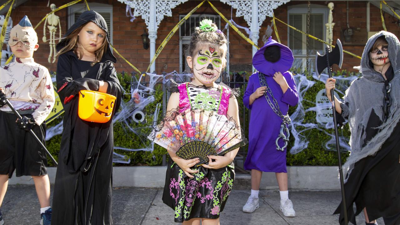 Harvey, 8, and Mischa, 8, Haywood, and Ella, 3, Samuel, 10, and Joshua, 7, Nixon, in Renwick Street, Drummoyne. Picture: Justin Lloyd.