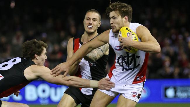 Jack Viney takes on St Kilda's Blake Acres. Picture: George Salpigtidis