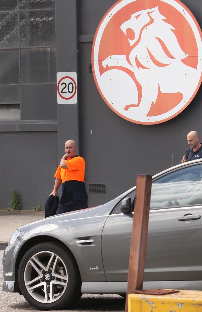 It’s over ... workers at Holden’s Port Melbourne plant after it was announced General Motors was closing its Australian operations.