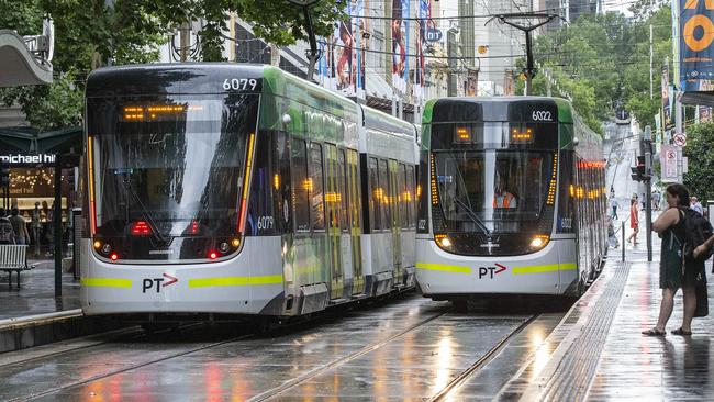 People getting on and off trams in the CBD. Picture: Sarah Matray