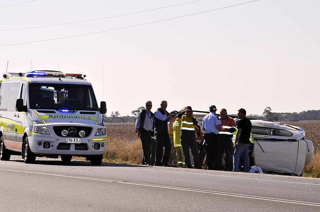 Emergency services at the scene of a fatal traffic crash 10km east of Dalby on the Warrego Hwy.