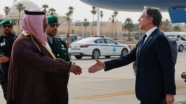 US Secretary of State Antony Blinken is welcomed by Saudi Ministry of Foreign Affairs Director of Protocol Affairs Mohammed Al-Ghamdi as he visits Saudi Arabia. Picture: AFP