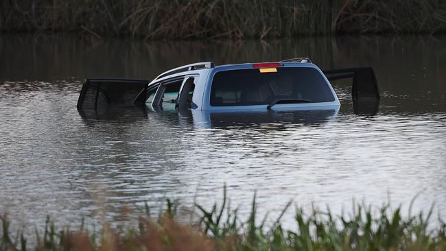 The scene of the horrific crash into a lake at Wyndham Vale. Picture: Jake Nowakowski