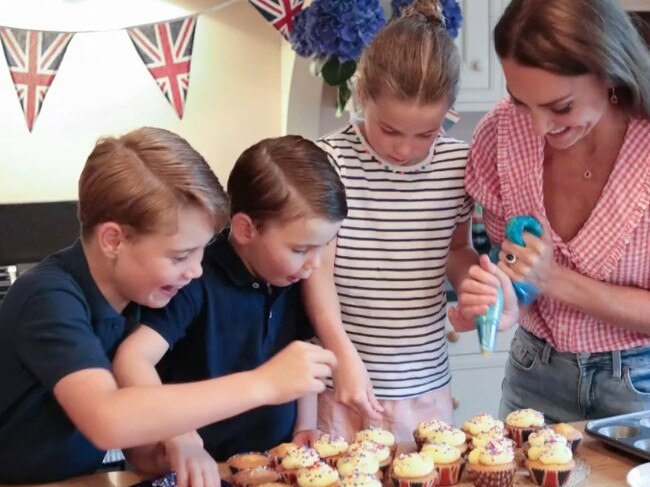 On images released on Instagram Catherine, Duchess of Cambridge, bakes with her children, Princess Charlotte of Cambridge, Prince George of Cambridge, and Prince Louis of Cambridge.