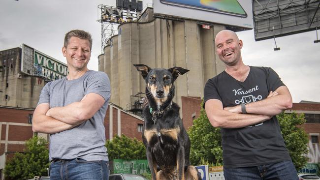 James Coxon and Ewan Tremellen with their dog Quip, just after buying their apartments in Cremorne in 2017. Picture: Jason Edwards.