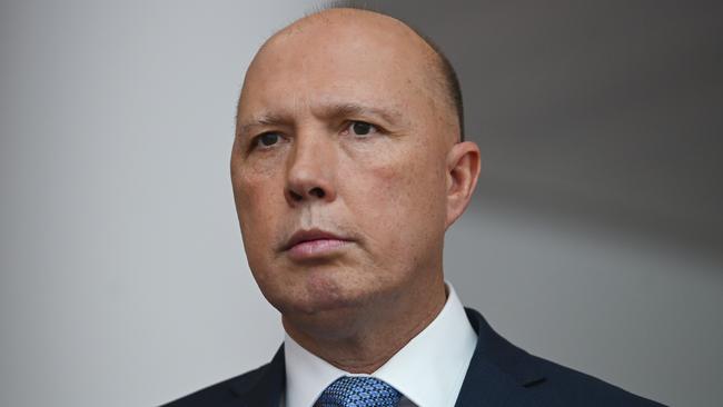 Home Affairs Minister Peter Dutton speaks to the media during press conference at Parliament House in Canberra on Thursday.