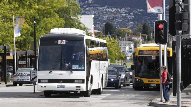 Rosny bus mall, Metro bus and Tasmania Police. Picture: Chris Kidd