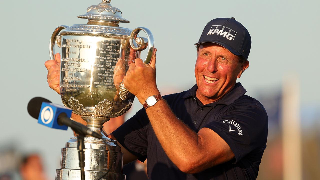 Phil Mickelson is staying out of the limelight. (Photo by Stacy Revere/Getty Images)