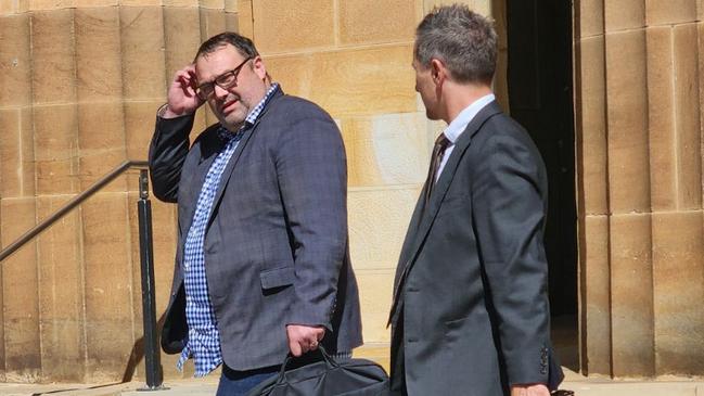 Director of Environment and Place for Burnside Council, Barry Cant, left, outside court on Wednesday after being fined and convicted for drink driving.