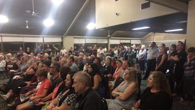 Protesters at a hospital meeting.