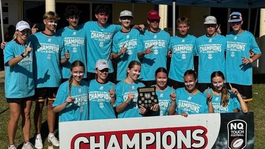 Southern Cross Catholic College open mixed touch team after winning the NQ All Schools in 2024. 2025 House Leaders Abbie Penny and Jaid Medill are pictured holding the shield in the middle. Picture: Supplied.