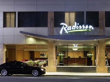 HNA checks out of Radisson hotel