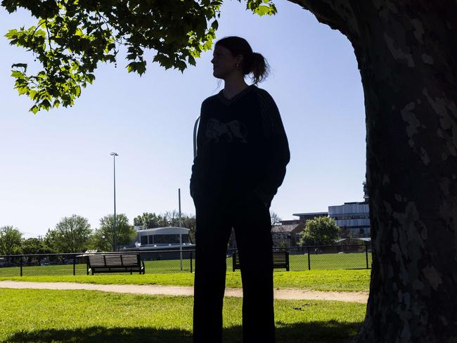 Senior Constable Elissa Dykstra from Yarra Crime Investigation Unit and the victim Poppy at Richmond Police station after Poppy was attached and punched by a man. Pictures need to be Non identifying of Poppy.Picture by Wayne Taylor 9th October 2024