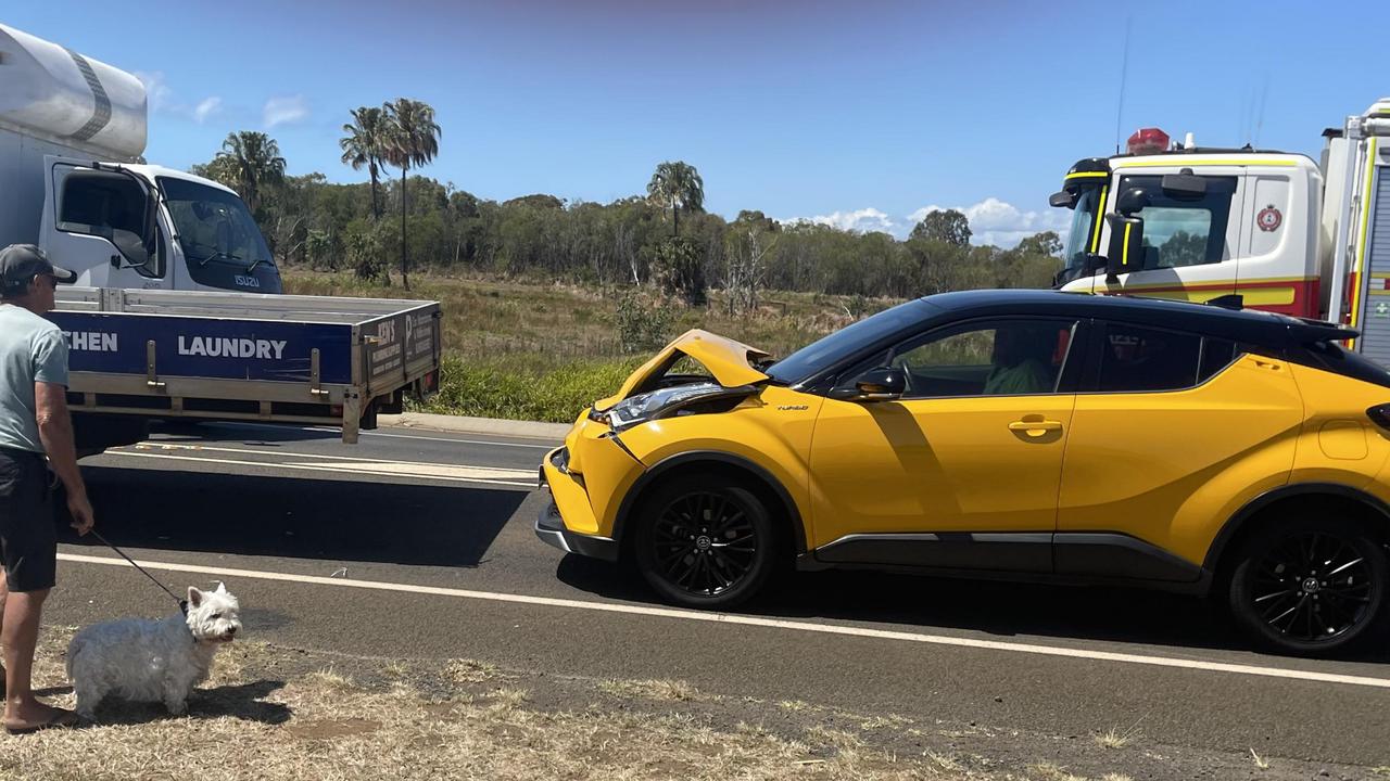 A yellow Toyota collided with the back end of the flat-bed truck in the crash.