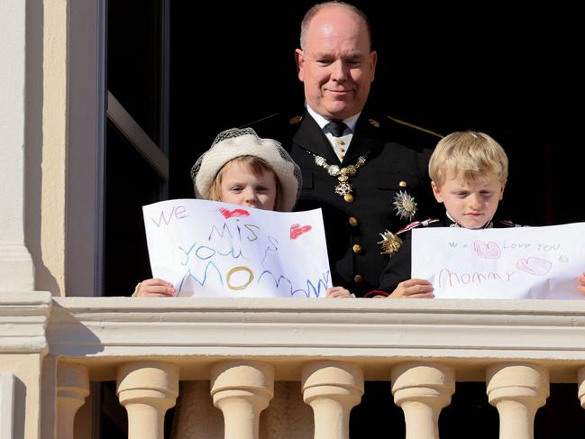 Princess Gabriella and Prince Jacques held messages for Princess Charlene in November. Picture: Valery Hache/AFP