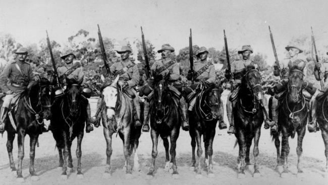 Morant, third from left, with soldiers from 2nd South Australian mounted rifles contingent.