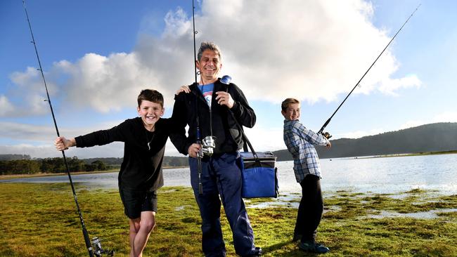 Chris Fenech and sons Luke, 10, and Ben, 11, are keen to fish at Myponga Reservoir at the end of the year. Picture: Tricia Watkinson