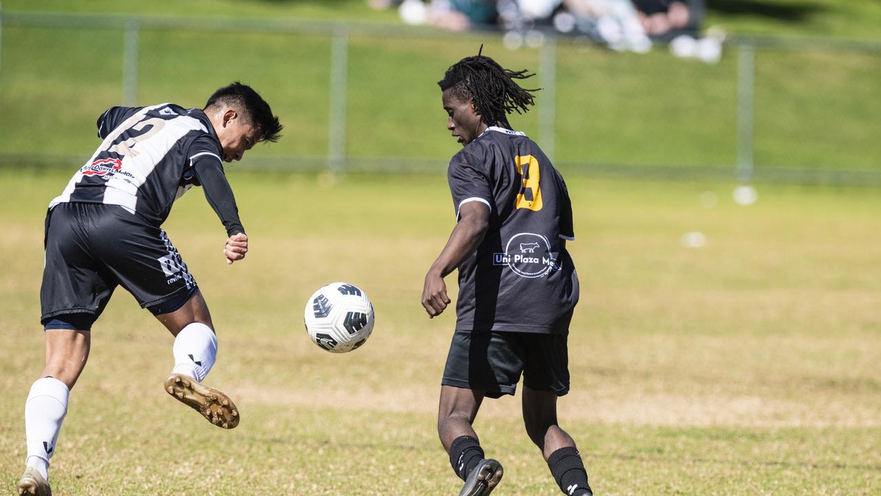 Umesh Rai (left) of Willowburn against Peter Jeapson of West Wanderers in U23 men FQ Darling Downs Presidents Cup football at West Wanderers, Sunday, July 24, 2022. Picture: Kevin Farmer