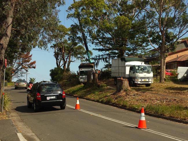 Workers did not muck around at the Scenic Highway upgrade site on day one. This was the scene at 4.30pm.