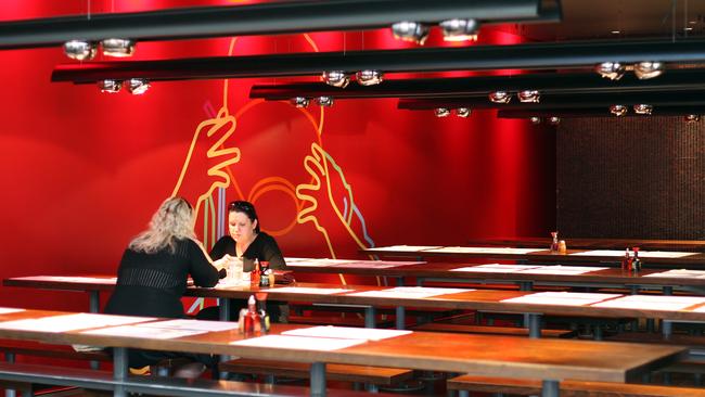 A near-empty former Wagamama Australian dining room.