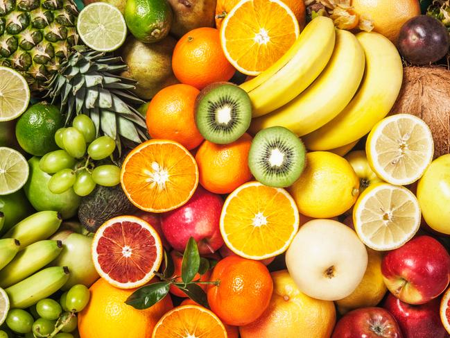 Fresh fruit background. Healthy eating and dieting concept. Winter assortment. Top view