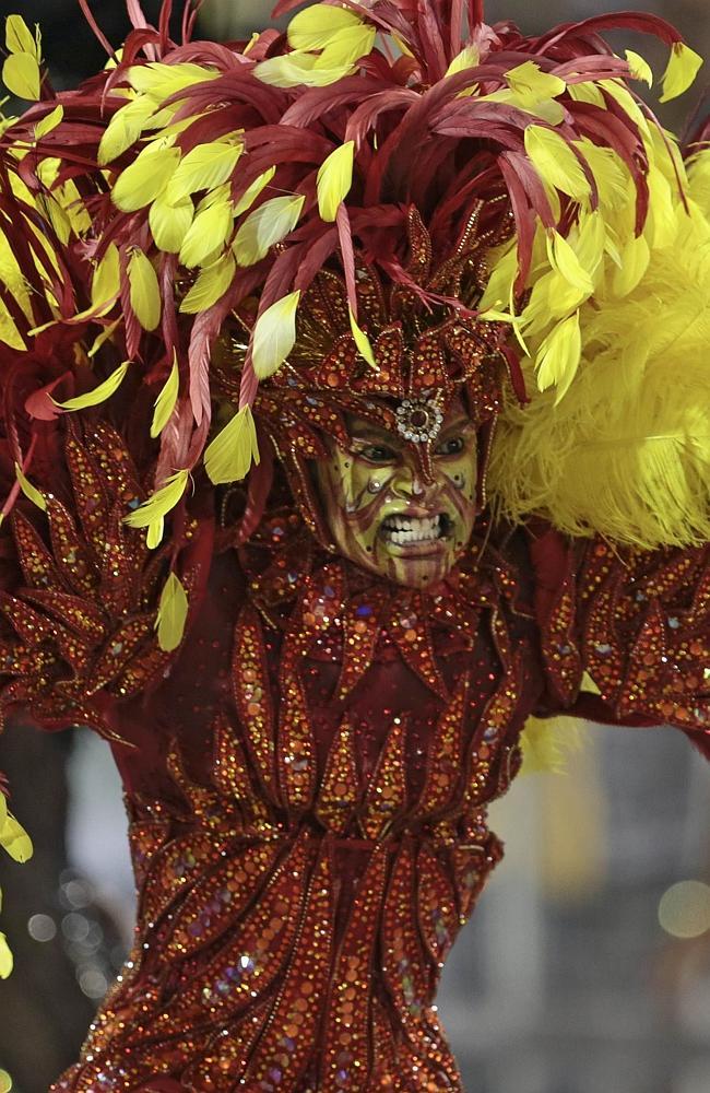 A dramatically-costumed reveller from the Imperio de Casa Verde samba school in Sao Paulo. 