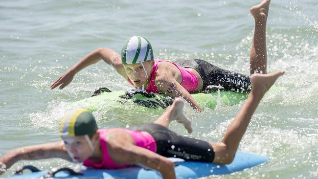 Mona Vale’s Tobias Woolnough (top) in action during his leg of the under-10 Male Board Relay semi-final at the NSW Surf Life Saving Championships at Blacksmiths Beach on Friday, 28 February, 2020. Picture: Troy Snook