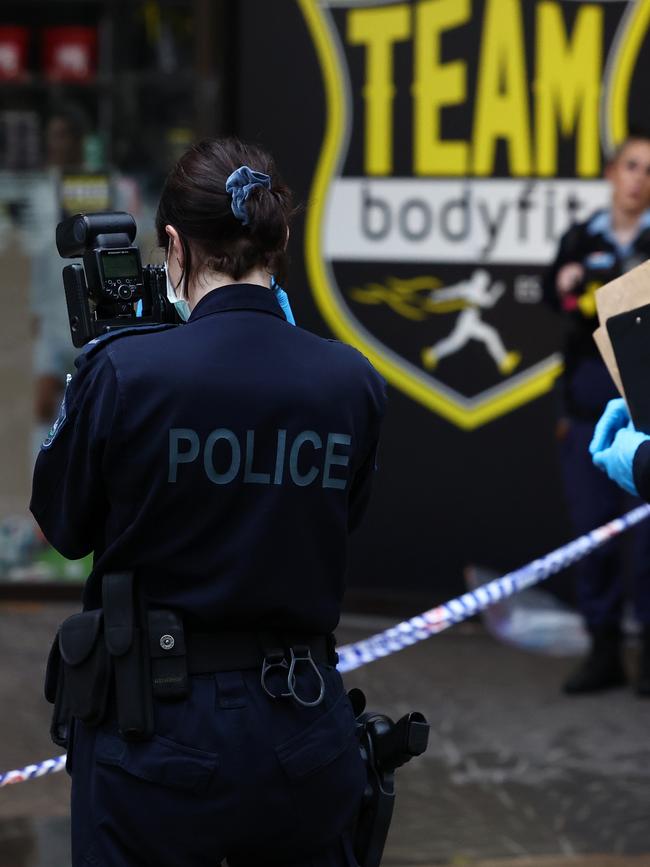 Officers attend the scene at the gym where Omar and Tarek were gunned down. Picture: Supplied