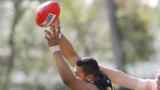 Damian Cupido flies for a mark in the Ballarat league grand final in 2016. Picture: David Crosling