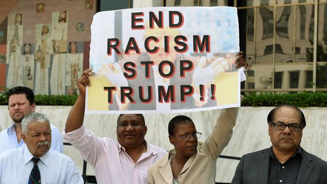 A coalition of Latino community leaders protest against the policies of Republican presidential hopeful.