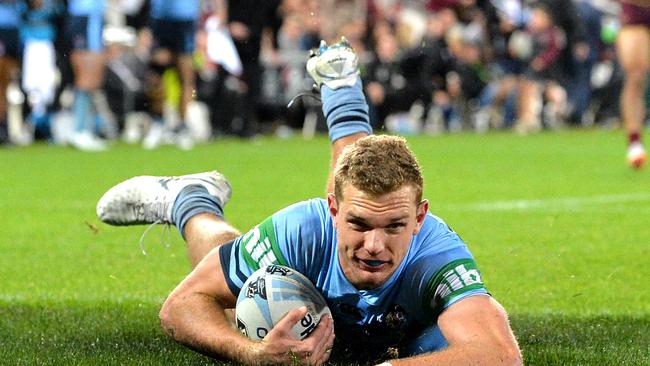 Tom Trbojevic streaks away to run the length of the field and score against the Blues. (Photo by Bradley Kanaris/Getty Images)