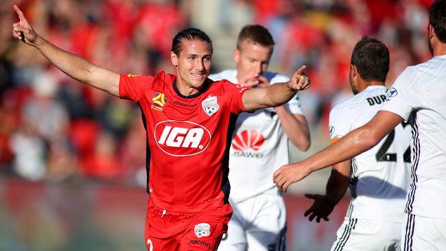 Michael Marrone celebrates scoring Adelaide’s opening goal against the Phoenix at Coopers Stadium. Picture: Getty Images