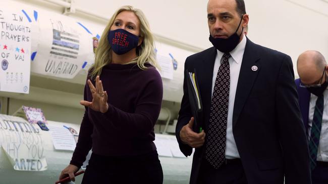 Marjorie Taylor Greene, left, talks to Bob Good as they walk in the Cannon tunnel after a vote at the US Capitol on February 4. Picture: AFP