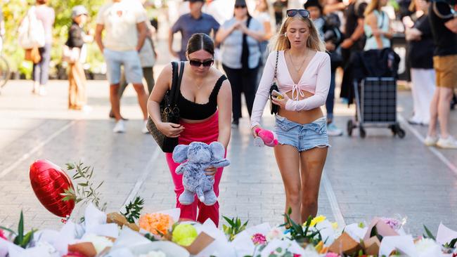 Floral tributes and condolences from members of the public outside Westfield Bondi Junction after the massacre on the weekend. Picture: NCA NewsWire / David Swift