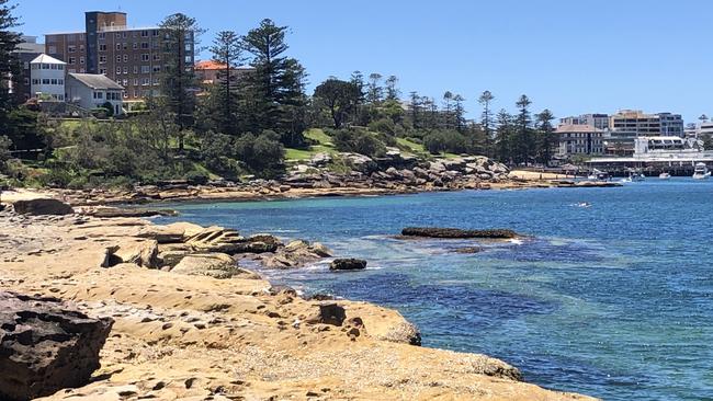 The rock platform between Delwood and Fairlight beaches where police allege a man was punched, sustaining critical injuries. Picture: Jim O'Rourke